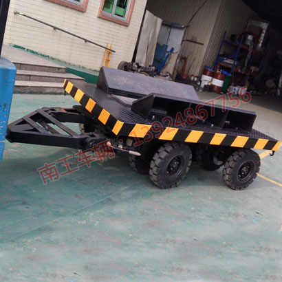 1677135411911099.jpg 10噸車間工件鐵皮卷圓桶運(yùn)輸平板拖車I.jpg