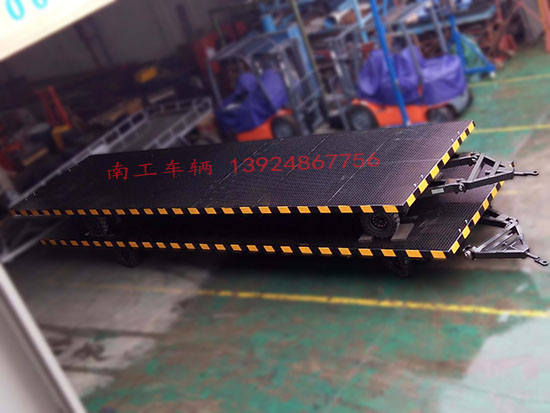 1677478434629589.jpg 10噸8米平板拖車1I.jpg