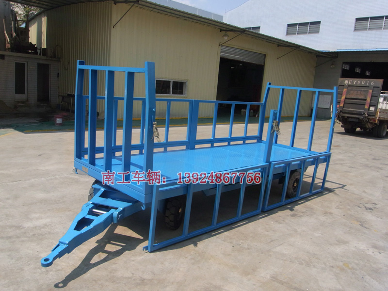 1678084365382251.jpg 3T下翻式護(hù)欄平板拖車8.jpg